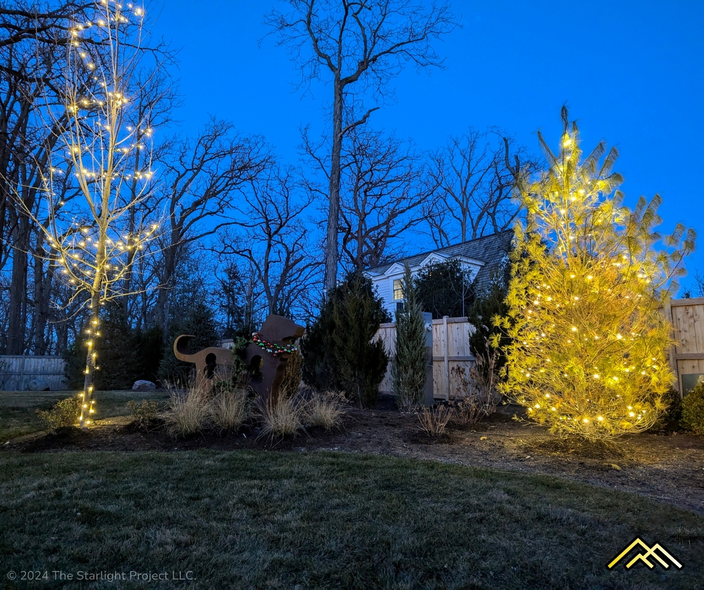 Decorated Trees Next to Pet Memorial